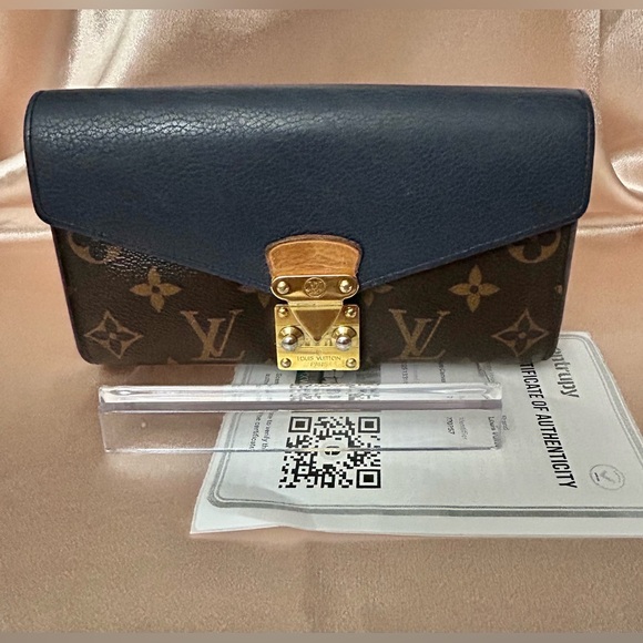 Louis Vuitton Handbags - Louis Vuitton Pallas Monogram & Leather Wallet SN0157